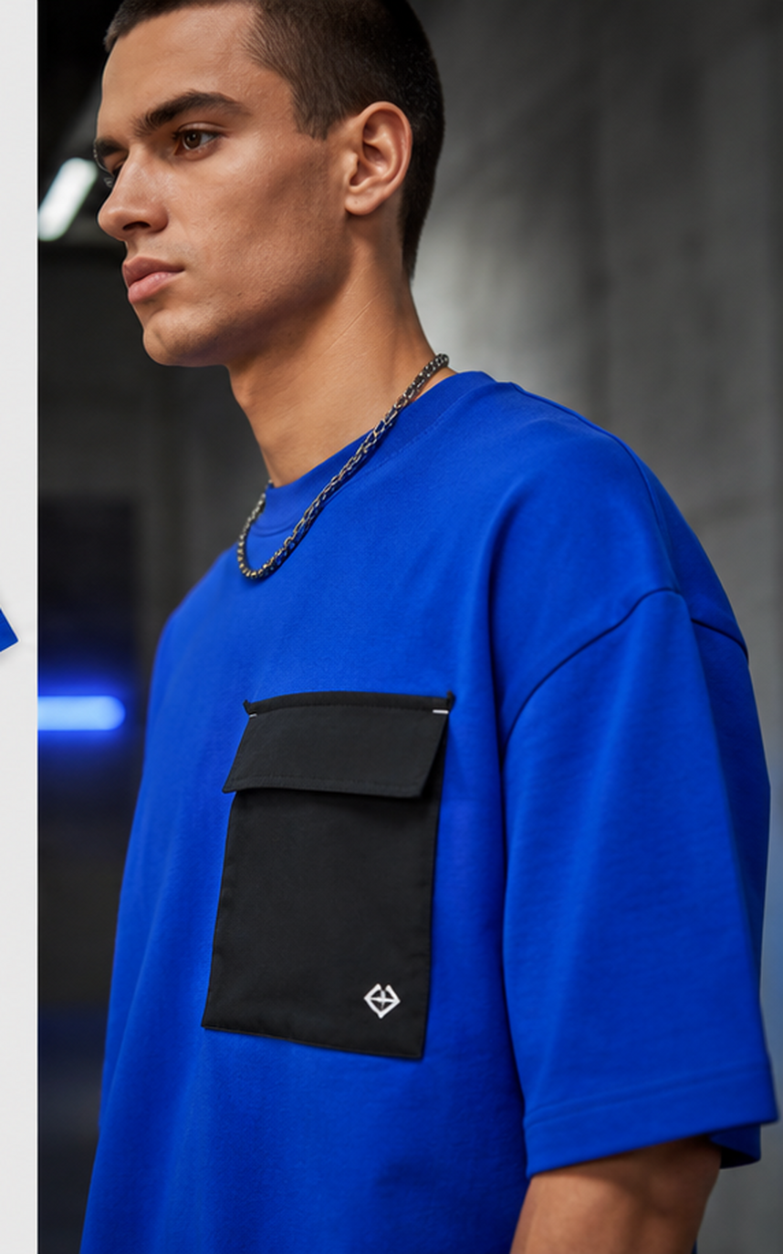 Close side view of the Signal Drift tee showing pocket and bartack details