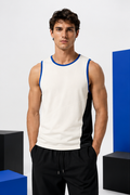 Male model wearing the off-white Static Form cutaway tank in a graphic studio